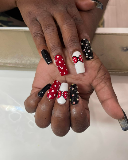 Creative nail art with geometric patterns - Professional nail salon OH